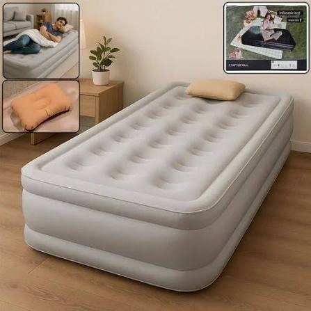 Inflatable air bed with built-in pump shown in a bedroom setting