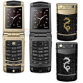 Rock V Dragon luxury flip phone in gold and black with dragon emblem
