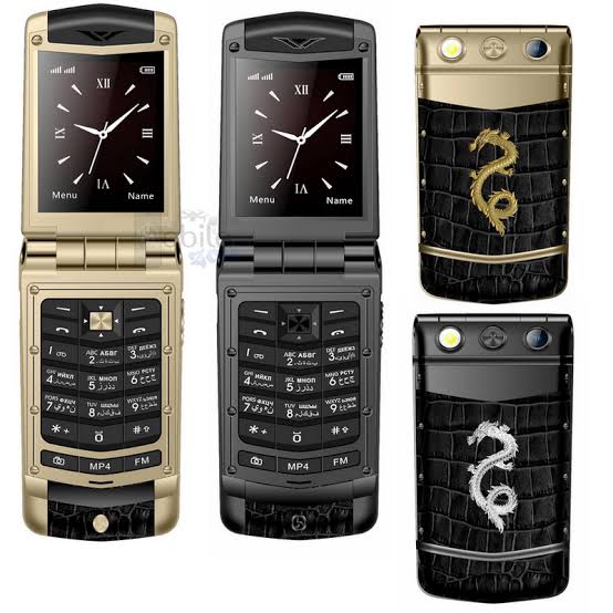 Rock V Dragon luxury flip phone in gold and black with dragon emblem
