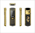 Snexian V1 Gold Dragon luxury feature phone front back and side views